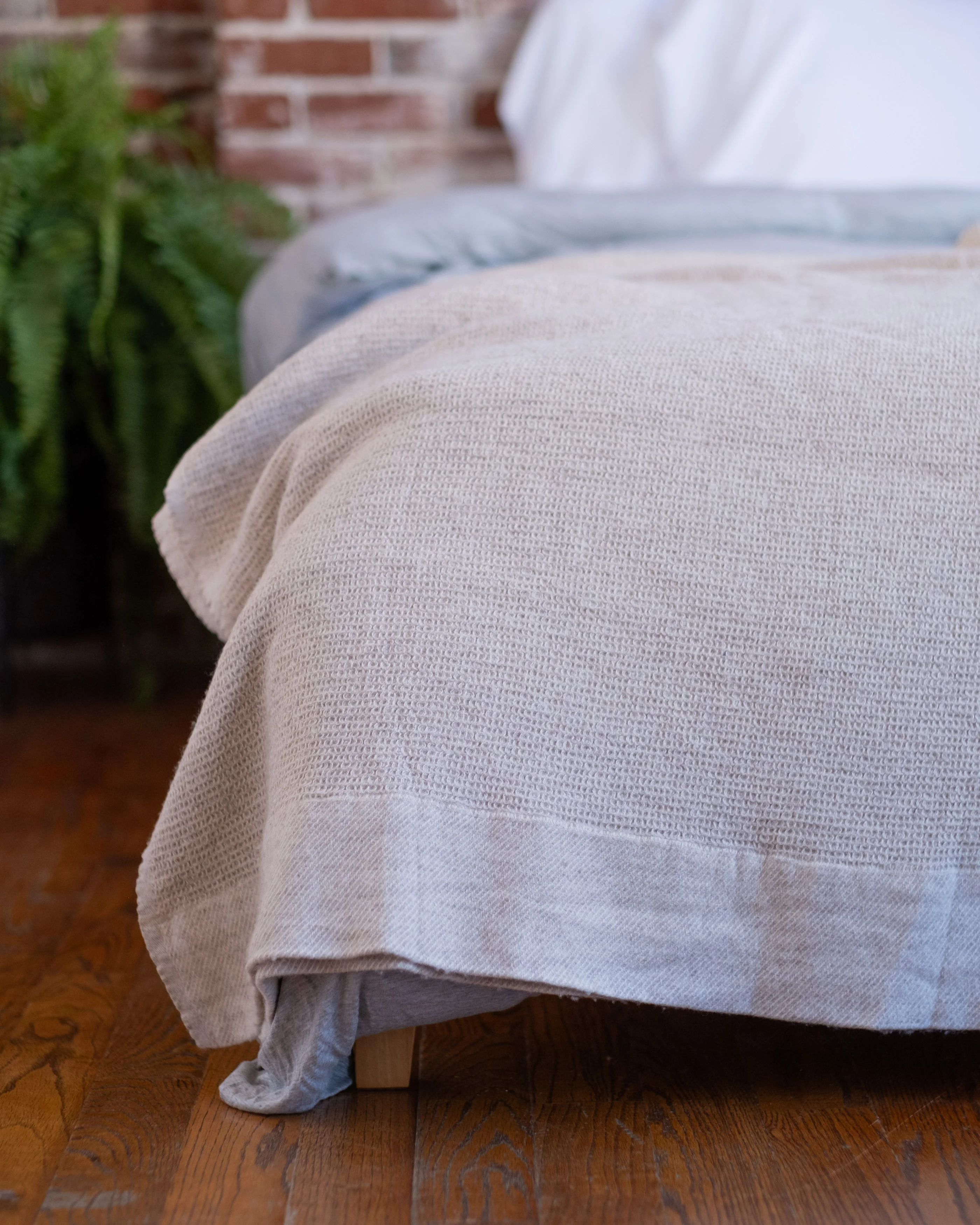 The Micro Waffle Wool Blanket in Bone - Image 8