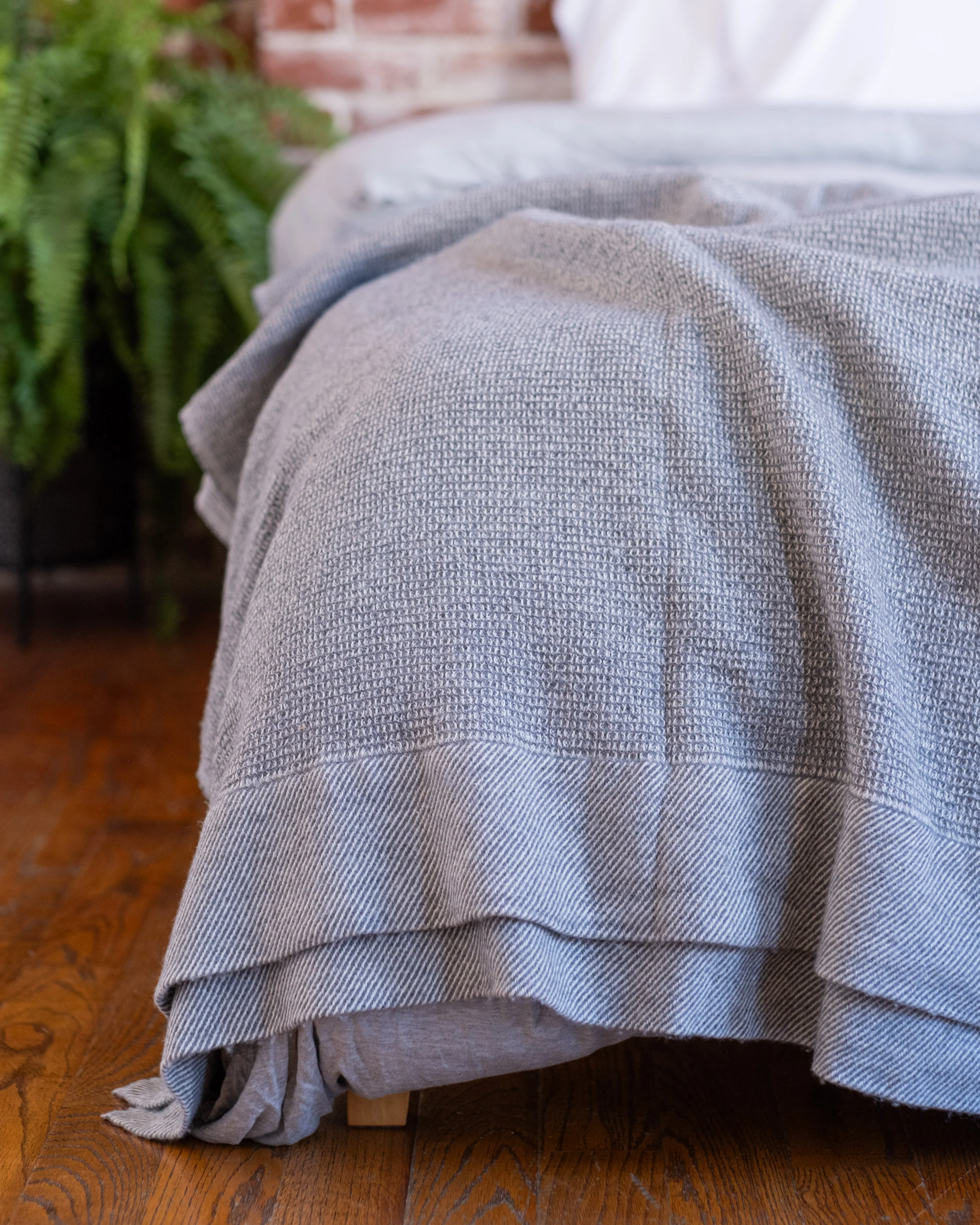 The Micro Waffle Wool Blanket in Stone - Image 6
