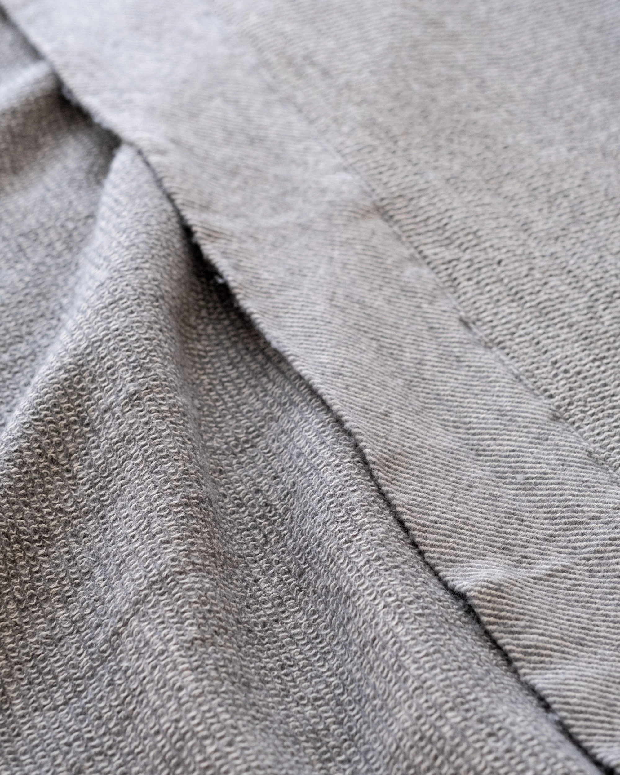 The Micro Waffle Wool Blanket in Stone - Image 8