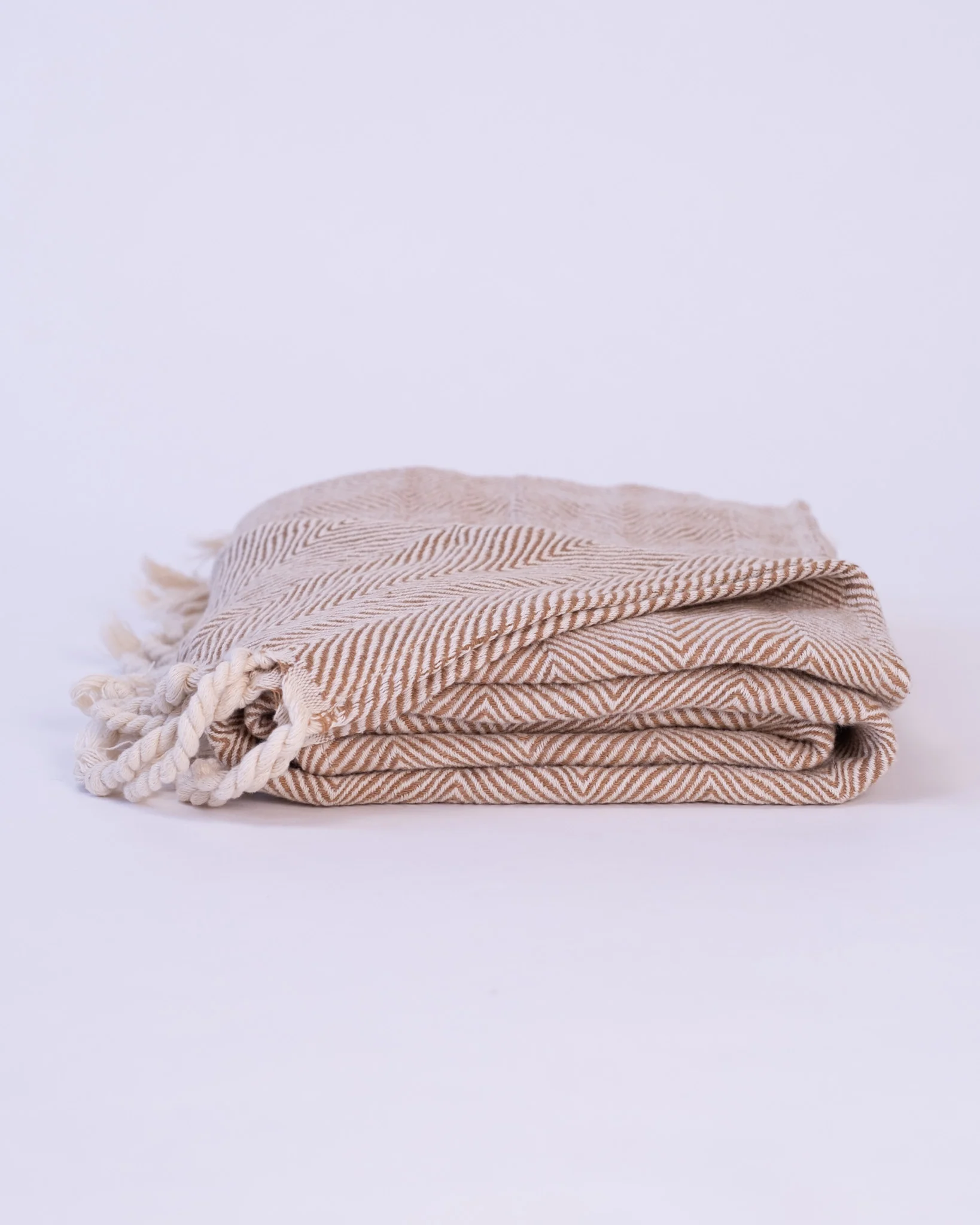 The Linen Herringbone Throw in Camel - Image 3
