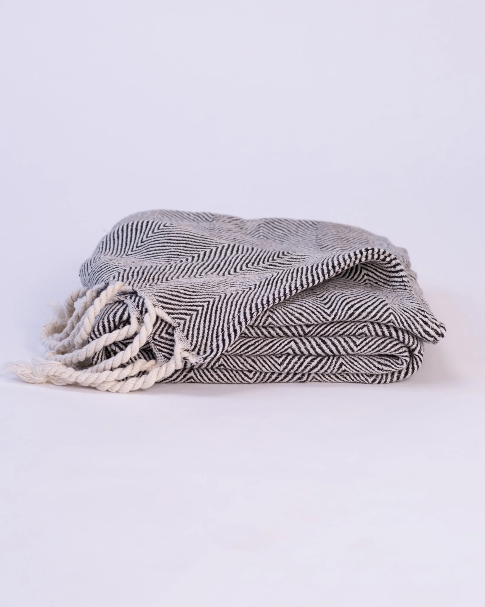 The Linen Herringbone Throw in Charcoal - Image 3